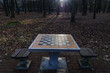 Table with chess board in Szczesliwicki Park, Warsaw city, Poland