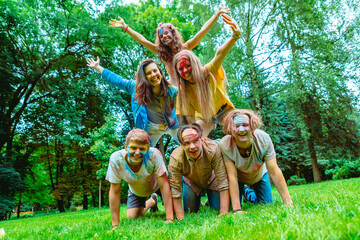 Wall Mural - young happy friends at holi fest