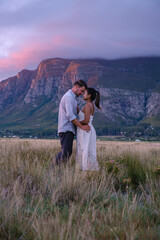 Wall Mural - Mountains and grassland near Hermanus at the garden route Western Cape South Africa Whale coast. man and woman in grassland during a vacation in South Africa