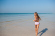 © travnikovstudio - beautiful girl having fun on tropical seashore