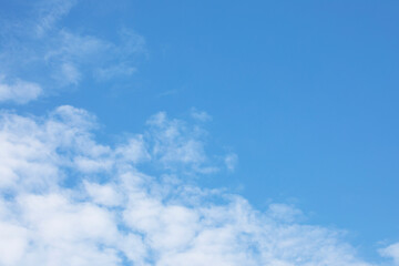Wall Mural - Blue sky background and white clouds soft focus, and copy space