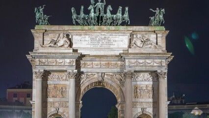 Wall Mural - Arch of Peace in Simplon Square timelapse at night. It is a neoclassical triumph arch