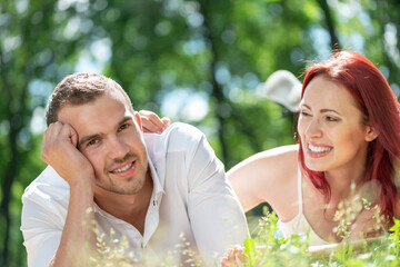 Wall Mural - Young couple on a date in the park