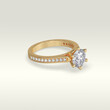 © CADjewels - solitaire engagement ring laying down position in yellow gold 3D render