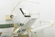 © JackF - Interior of modern dental practice room with chair, lamp, display and stomatological tools