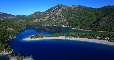 Wall Mural - aerial drone footage of famous tourism place blue lagoon oludeniz fethiye turkey fethiye above by the ocean