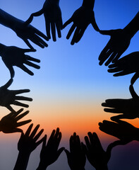 Poster - United around every horizon. Shot of a group of hands spread out together in a circle.