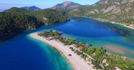 Wall Mural - aerial drone footage of famous tourism place blue lagoon oludeniz fethiye turkey fethiye above by the ocean
