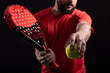 © FotoAndalucia - Anonymous man ready for paddle tennis serve in studio shot
