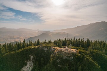 Aerial of Poiana Zanoaga in valley, Piatra Craiului natural reserve from Romania. Piatra Mica or Cabana Curmatura in Piatra Craiului National Park