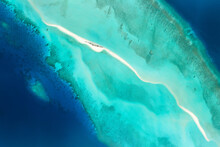 Aerial View Of Turquoise Sea And Lagoon In Maldives
