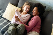 Loving african american foster care parent single mother embrace teen daughter