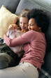 Loving african american foster care parent single mother embrace teen daughter