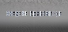 Demonic Possession Word Or Concept Represented By Black And White Letter Cubes On A Grey Horizon Background Stretching To Infinity