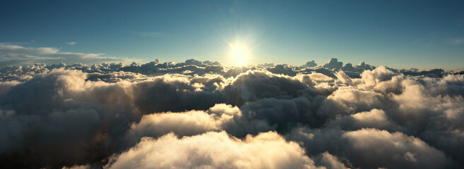 Wall Mural - Aerial view of clouds and morning sun