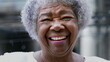 Leinwandbild Motiv A joyful older black woman authentic smile real happy expression