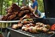 Ribs and bacon wrapped jalapenos on the grill at a backyard cookout