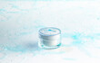 © candyhalls - Cream pot on water on white floor, Freshness, Beauty concept.