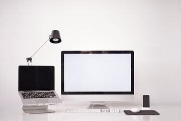Wall Mural - working hard on a brand new design. cropped shot of a handsome young man working on his laptop in an