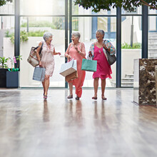 Its Time To Shop. Full Length Shot Of A Three Senior Women Out On A Shopping Spree.