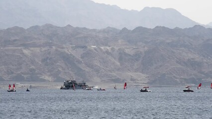 Wall Mural - Water sport and recreation activities on the Red Sea near  Eilat - popular resort and recreational Israeli city