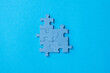 © Monica - Blue jigsaw puzzle pieces. Top view composition