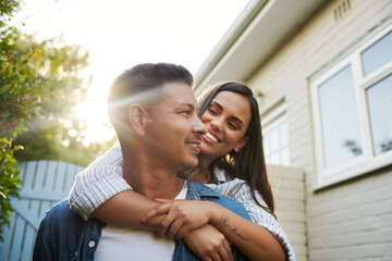 i love you. cropped shot of an affectionate young couple chilling outside on their patio in the yard