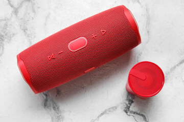 Wireless portable speakers on light background