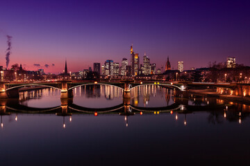 Wall Mural - Frankfurt skyline in the blue hour. building illuminated. In the