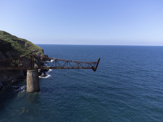 Wall Mural - Aerial view with drone of Old abandoned ore loading dock