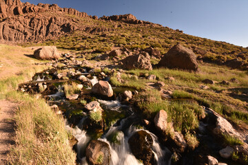 Wall Mural - Beautiful view of a river flowing through the rocks