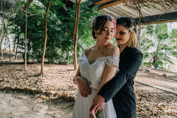 Poster - Closeup of the Caucasian Lesbian couple's sweet gestures on their wedding day