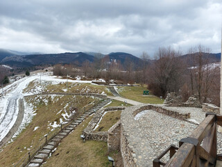 Poster - Beautiful view of mountain forests on a cloudy day taken from Medieval Fortress Malaiesti, Romania