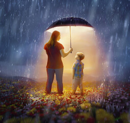 mother and son under umbrella