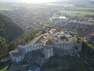 Sticker - Aerial shot of Rasnov Fortress over the residential area in Brasov, Transylvania in Romania