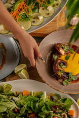 Wall Mural - Closeup of delicious dishes on the table