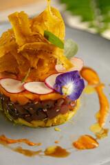 Wall Mural - Closeup of a salmon tartare with mango