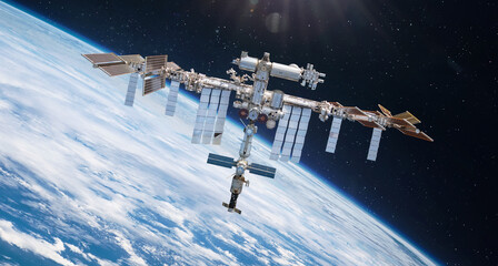 international space station on orbit of earth. space wallpaper with iss and planet surface. high res