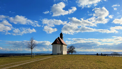 Poster - Beautiful view of an old chapel on a cloudy sky background