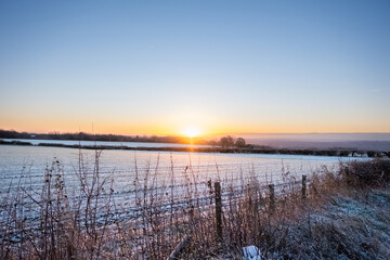 Poster - Beautiful view of a frozen landscape on a cold winter morning