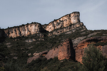 Wall Mural - view of a mountain and a green grass cover it