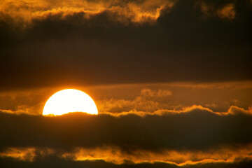 Wall Mural - Beautiful shot of the sun on the cloudy sky