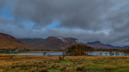 Sticker - Cloudy sky over a peaceful lake in the mountainous area, Scotland