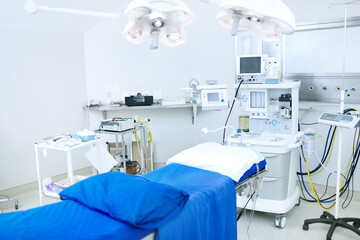 This operating room has all the latest technology. An operating room stocked with all necessary medical equipement.