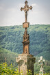 Old cross on abandoned cemetery in former town of Chervonohorod - Chervone in Ukraine