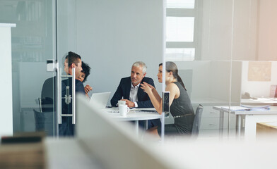 Aufkleber - Planning their next venture. Shot of a group of businesspeople having a meeting together in an office.