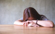© Farknot Architect - A young woman get tired and asleep on the table
