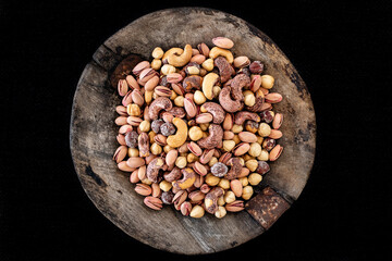 Wall Mural - Assorted selective nuts on the table.