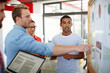 © D Laflor/peopleimages.com - Incorporating the latest trends in their designs. Shot of a group of designers discussing ideas in a meeting.