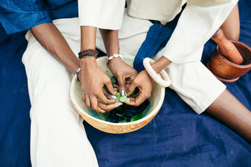 Canvas Print - Team working to eco dye their organic fabrics